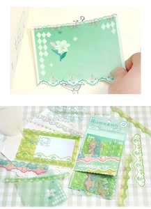 Detail of floral lace and butterfly themed stickers set with paper and PET textures