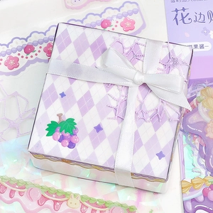 Vintage floral gift box with purple checkered pattern, white bow and lace trim