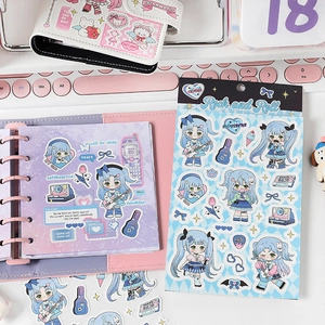 Anime rock girl planner stickers set with music and star motifs on a pink desk layout
