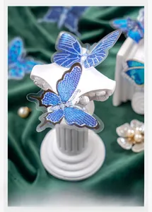 Macro shot of 30 blue butterfly decorative stickers with crystal texture for DIY journaling