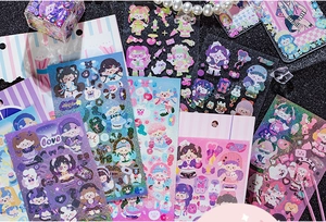 Detail of glitter laser stickers with cute girls and heart patterns for DIY crafts