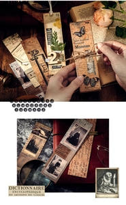 Detailed view of vintage aesthetic paper bookmarks with butterfly and retro portrait motifs