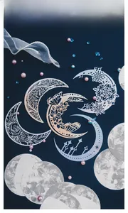 Macro view of laser-cut moon stickers and lunar textured paper for scrapbooking deco