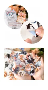 Macro detail of waterproof PET cat stickers showing adhesive backing and cute feline designs
