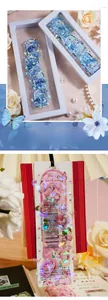 Macro detail of holographic floral PET stickers with shimmering effect for scrapbooking