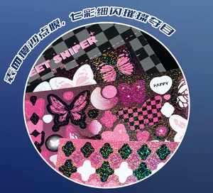 Detail of glitter butterfly stickers with holographic finish and pink heart patterns