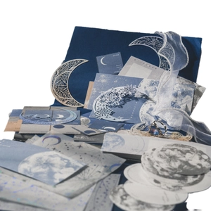 Celestial Moon and Star scrapbook kit with blue lace ribbons and moon phase stickers