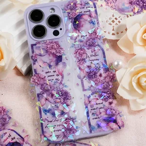 Floral holographic stickers on a clear phone case with purple artistic patterns