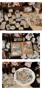 Detailed close-up of vintage butterfly and botanical stickers for scrapbooking decor