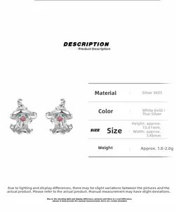 Macro detail of S925 sterling silver ghost earrings with enamel accents and dimensions