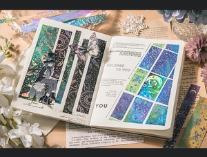 Detailed view of starry sky stickers and washi tapes used in an artistic bullet journal