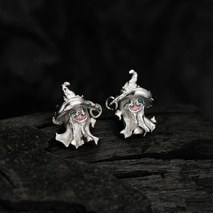 S925 sterling silver ghost witch stud earrings with colorful enamel on dark wood background