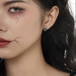 Gothic wizard hat silver stud earring on female model for Halloween accessory