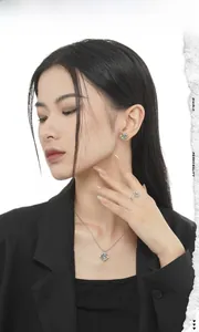 Business style S925 silver jewelry set with square zircon on female model in black blazer