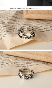 Close-up of vintage S925 sterling silver star ring showing engraved hallmark details