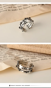 Detailed macro view of S925 sterling silver star ring with black zircon inlays