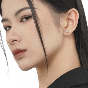Minimalist S925 sterling silver star stud earrings with white opal stone on model
