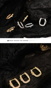 Detailed view of U-shaped pavé cubic zirconia hoop earrings in gold and silver finishes