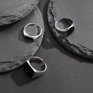 Minimalist S925 sterling silver open ring set with black enamel inlay on volcanic rock