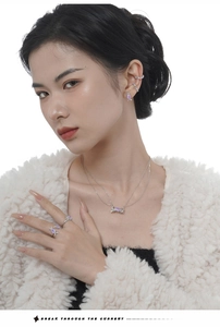 Detail of S925 silver candy necklace with lavender zircon inlay on model neck
