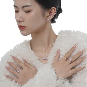 S925 sterling silver candy-shaped jewelry set with purple gemstones on female model