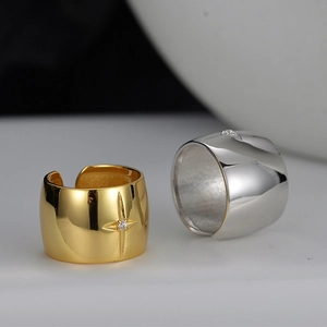Wide adjustable starburst rings in gold and silver finish with micro-set zircon