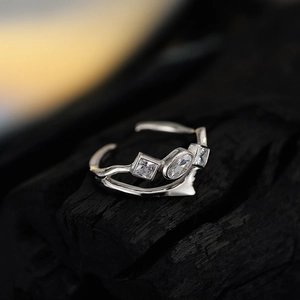 Minimalist S925 sterling silver wave ring with sparkling zircon stones in a sleek design