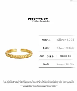 Detail view of gold S925 sterling silver open ring with twisted rope texture and specs