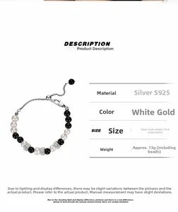Detail of S925 silver bracelet with freshwater pearls and obsidian beads