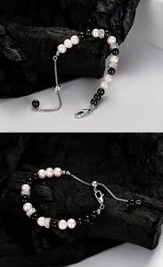 Close-up of S925 silver clasp and adjustable chain with freshwater pearls and obsidian beads