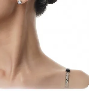 Close-up of S925 silver halo stud earrings with a large round cubic zirconia center
