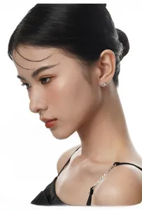 Close-up of elegant pink round zircon halo stud earrings in S925 sterling silver finish