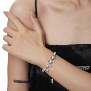 Elegant S925 sterling silver baroque pearl bracelet with sparkling zircon on model
