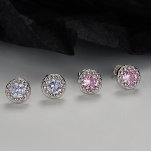S925 sterling silver stud earrings with round white and pink cubic zirconia and bead edges