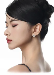 Close-up of S925 sterling silver clover earrings with grey agate on an Asian model's ear