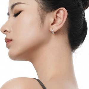Elegant S925 sterling silver hoop earrings with irregular texture and sparkling zircon