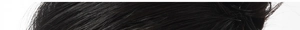 Detailed macro view of silky black hair texture showing smooth luster and straight strands