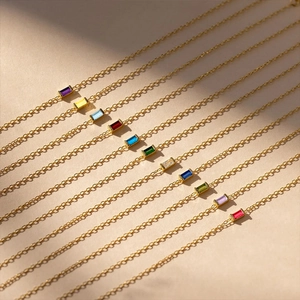 Golden birthstone pendant necklaces with multi-color rectangular gems in parallel layout