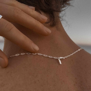 French vintage stainless steel paperclip chain necklace on female model neck
