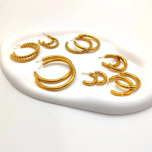 Set of six pairs of gold-plated stainless steel hoop earrings in various textures