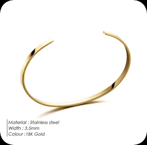 Detail of 3.5mm minimalist 18K gold stainless steel cuff bracelet with smooth finish