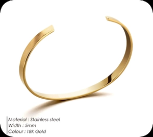 Detailed close-up of 5mm 18K gold stainless steel cuff bracelet with brushed finish