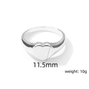 Polished silver heart signet ring detail showing 11.5mm width and 10g weight specs
