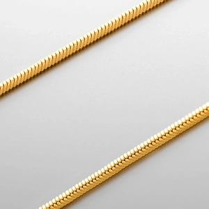 Elegant gold snake bone chain necklace for men with a polished metallic finish and sleek design