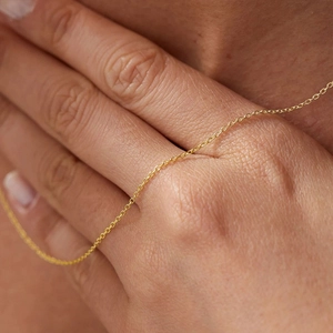 Elegant minimalist gold stainless steel cable chain necklace for women worn on neck