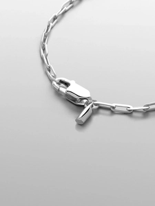 Close-up of modern stainless steel paperclip chain necklace with a lobster clasp