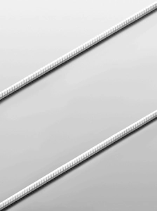Macro shot of a high-quality silver snake chain necklace with smooth metallic texture
