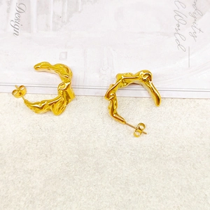 Golden C-shaped stainless steel earrings with irregular molten metal pleated texture