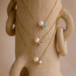 14K gold plated necklace set with white pearls and blue, pink, and clear gemstones