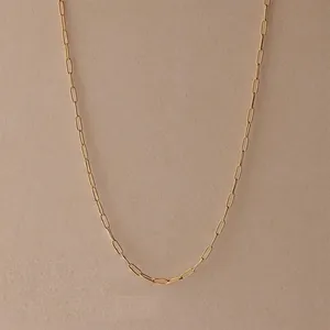 Detailed close-up of 14k gold plated stainless steel paperclip chain necklace links